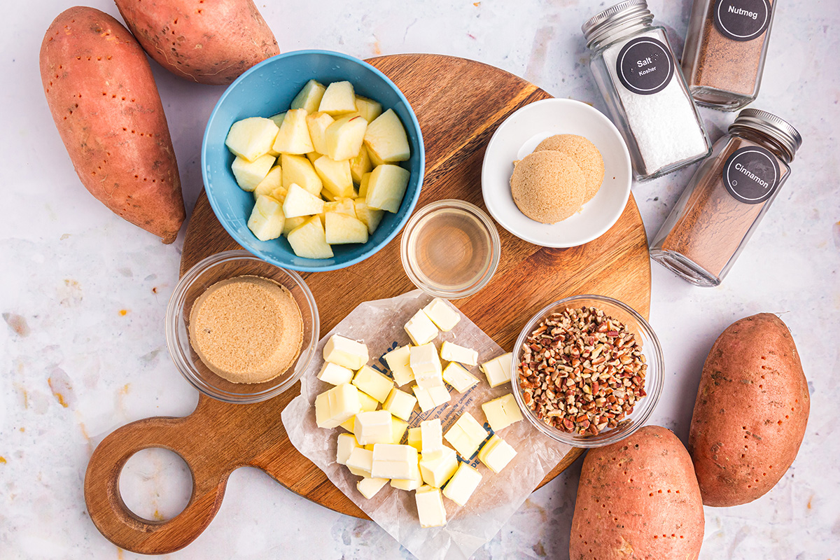 overhead shot of apple spiced stuffed sweet potatoes ingredients