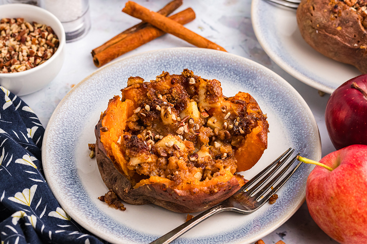 angled shot of stuffed sweet potato on plate