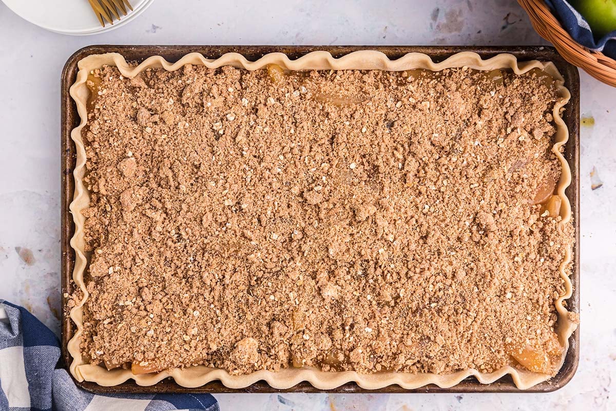 overhead shot of unbaked apple slab pie