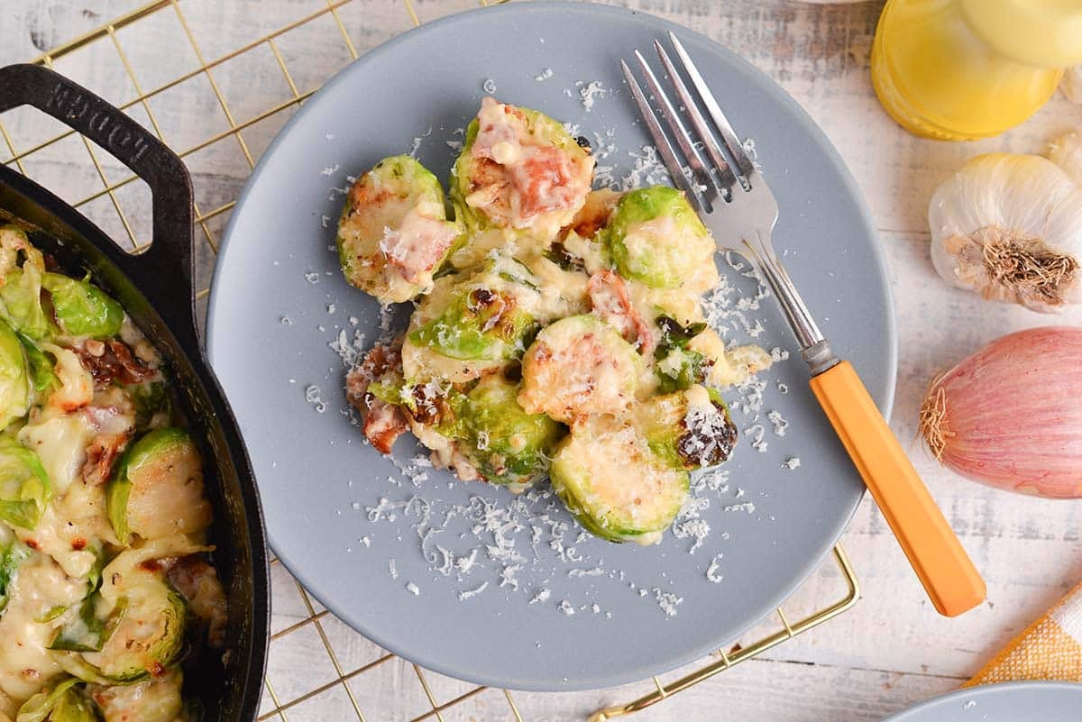 close up overhead shot of creamy brussels sprouts on plate