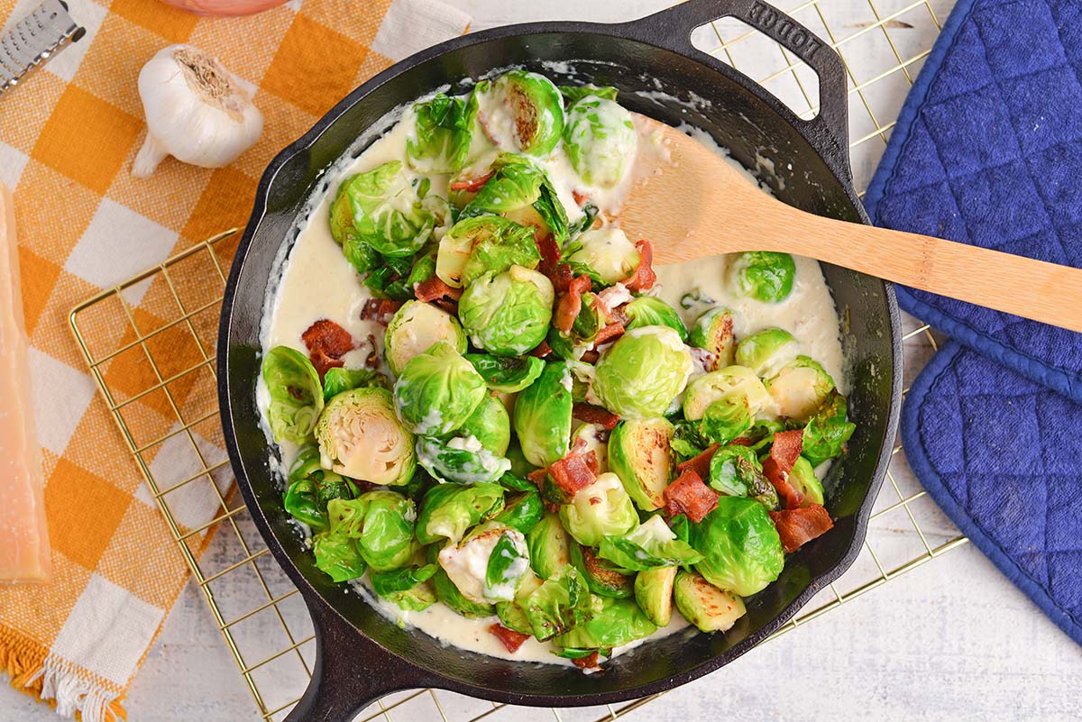 brussels sprouts in cream sauce in pan