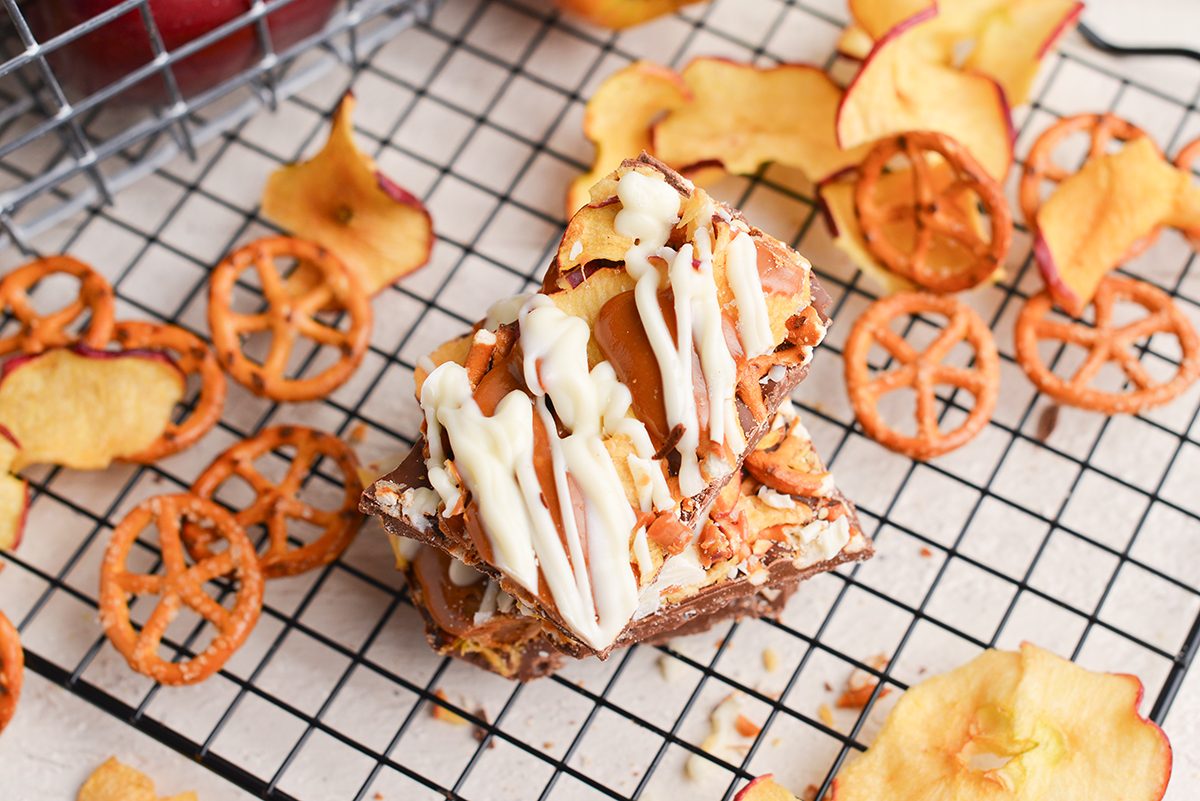 stack of caramel apple bark on a wire cooling rack