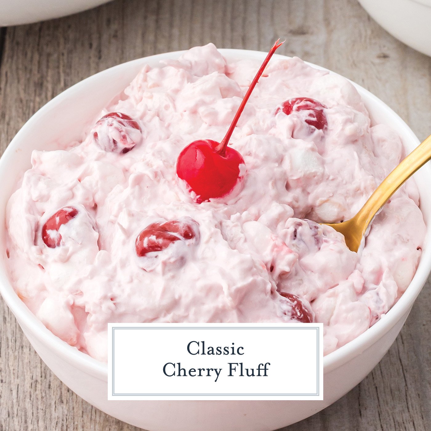 angled shot of bowl of classic cherry fluff with text overlay for facebook