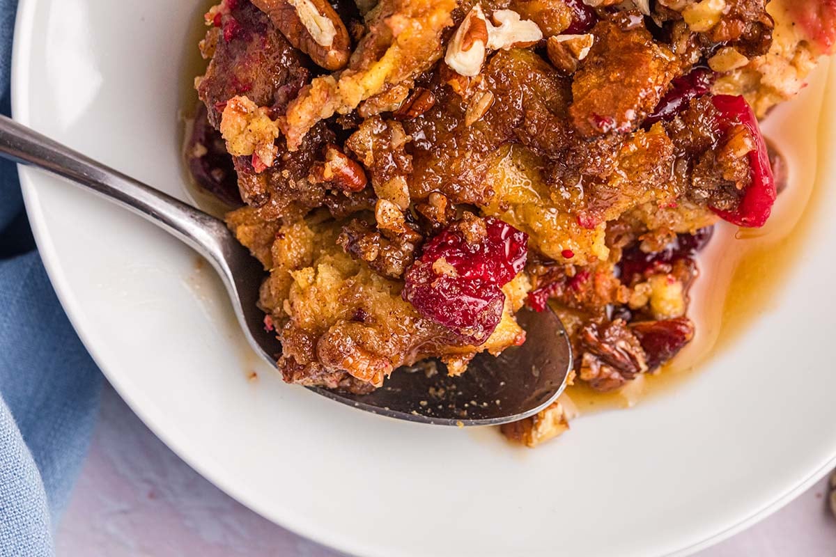 close up of bite of breakfast casserole on spoon