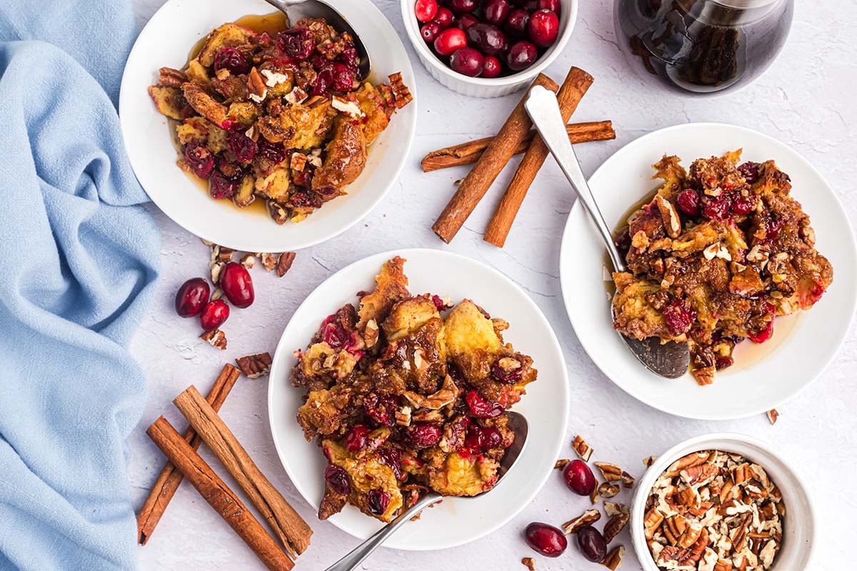 overhead shot of three plates of french toast casserole