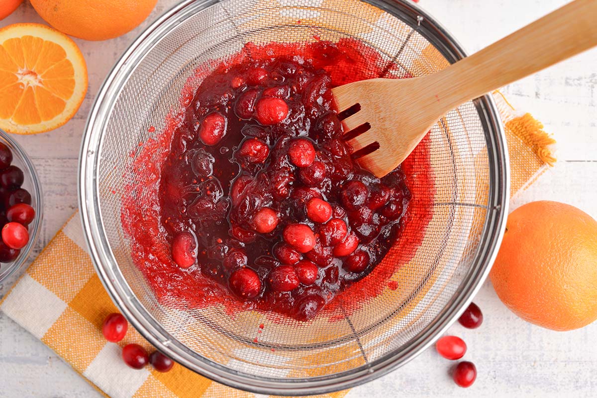 straining cranberry relish through a colander