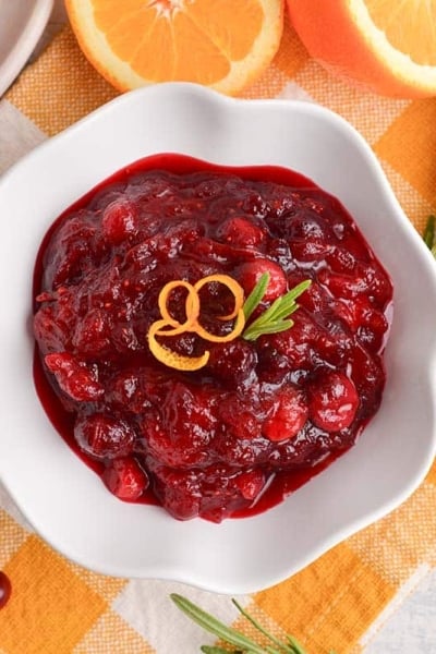 overhead of orange cranberry relish with orange zest garnish