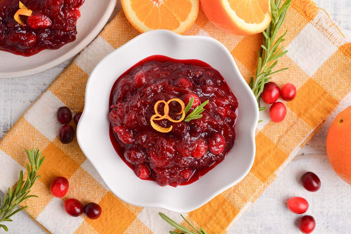 overhead of orange cranberry relish with orange zest garnish