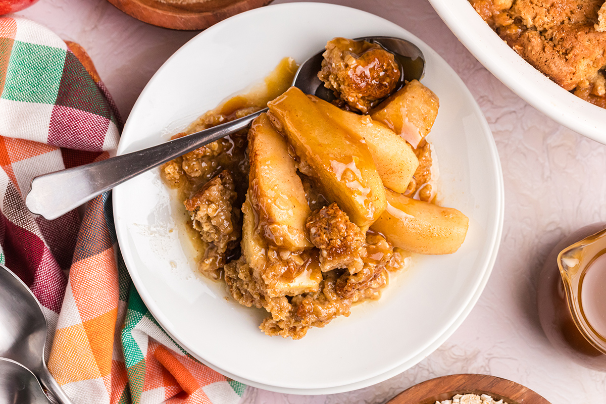 overhead shot of apple crisp on plate with spoon