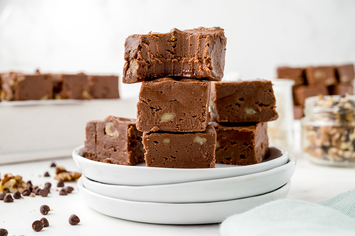 stack of three pieces of fudge with bite taken out