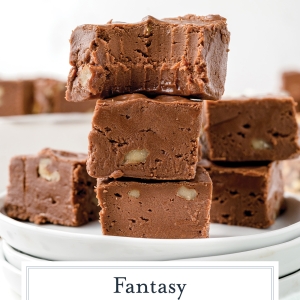 bite taken out of stack of fantasy fudge with text overlay for pinterest