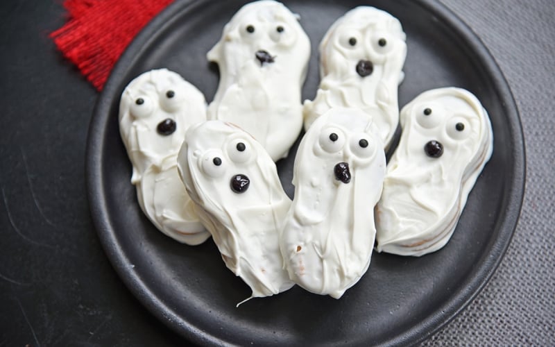 ghost Cookies on a black plate