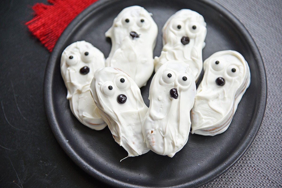 ghost Cookies on a black plate