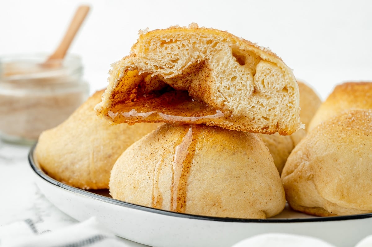 straight on shot of cinnamon dripping out of hocus pocus bun