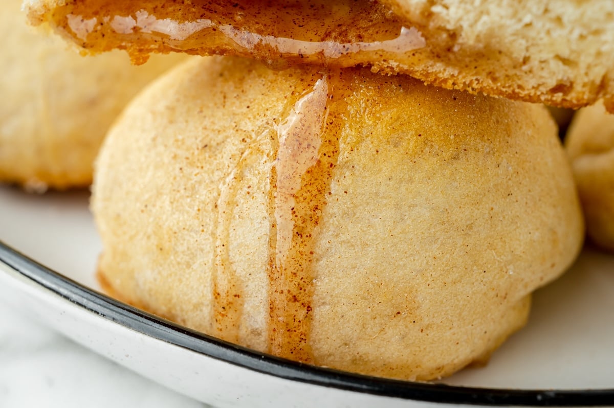 close up of cinnamon dripping out of hocus pocus bun