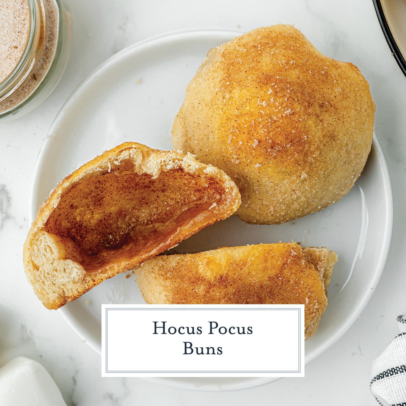 overhead shot of hocus pocus buns cut in half with text overlay for facebook