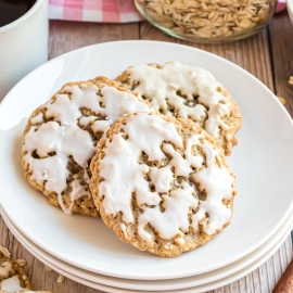 plate of oatmeal cookies with icing