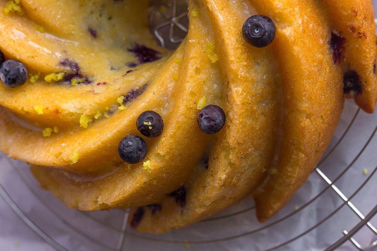 close up to swirl in lemon blueberry cake