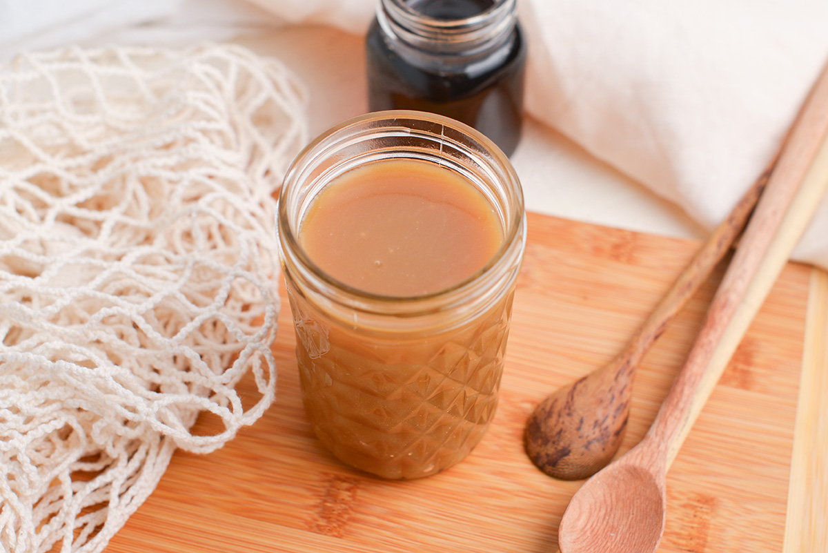 angled shot of jar of maple cream sauce