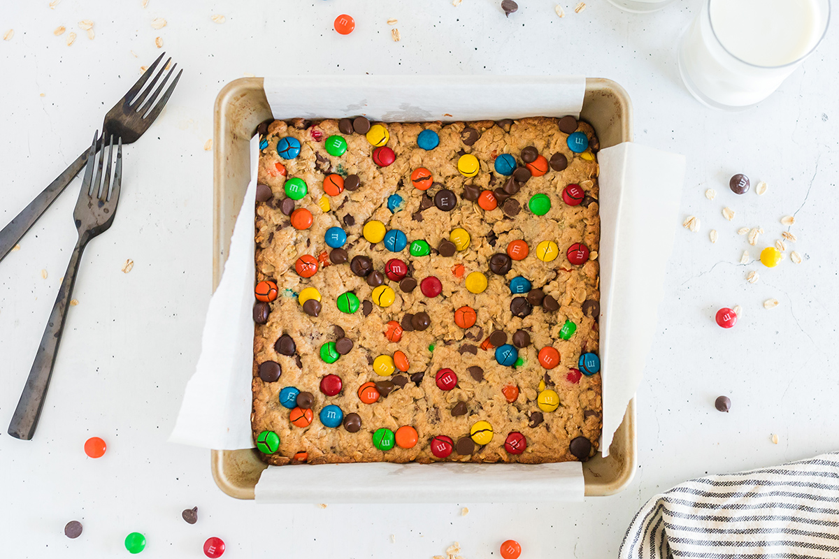 overhead shot of monster cookie bars baked in pan