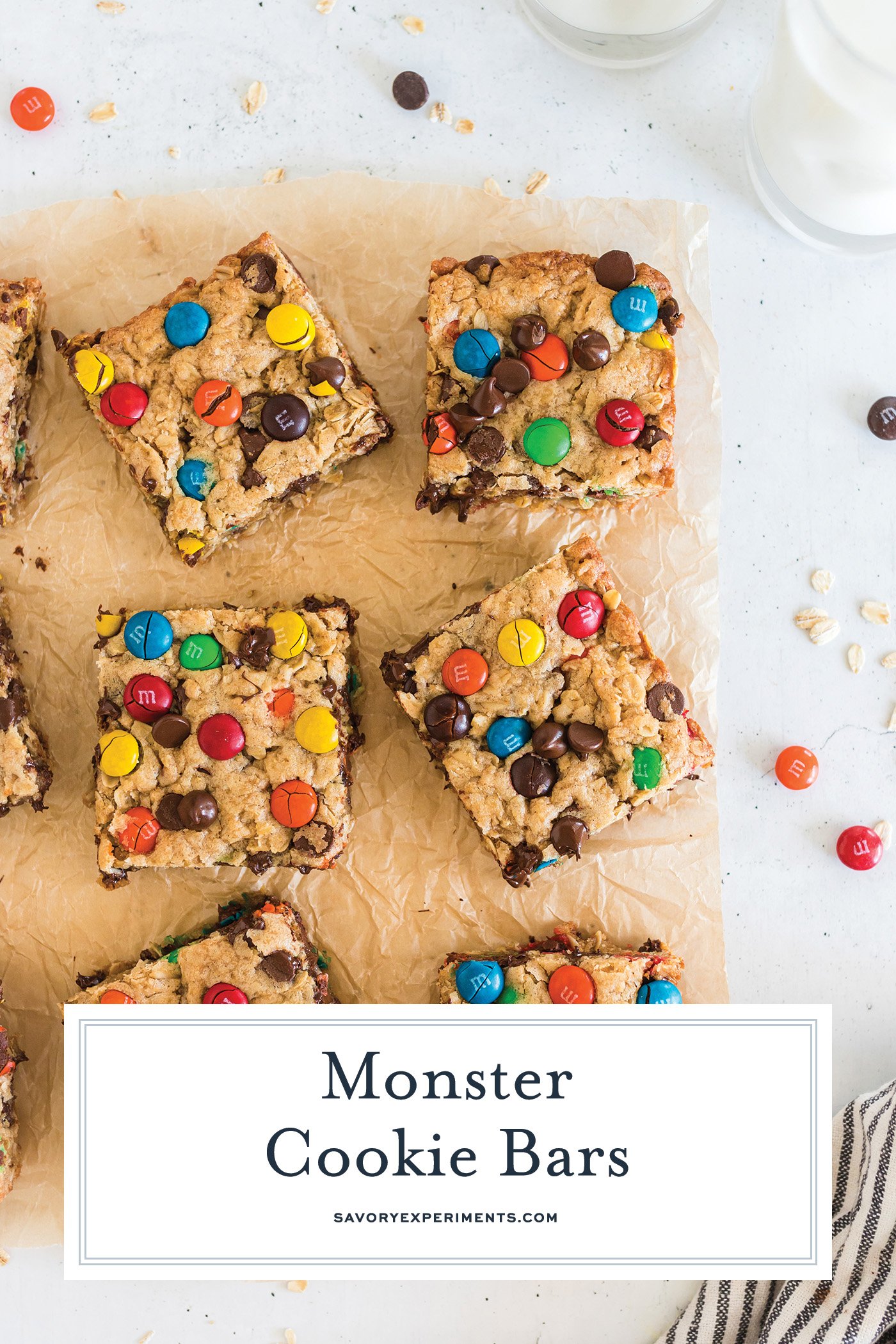 overhead shot of cut monster cookie bars with text overlay for pinterest
