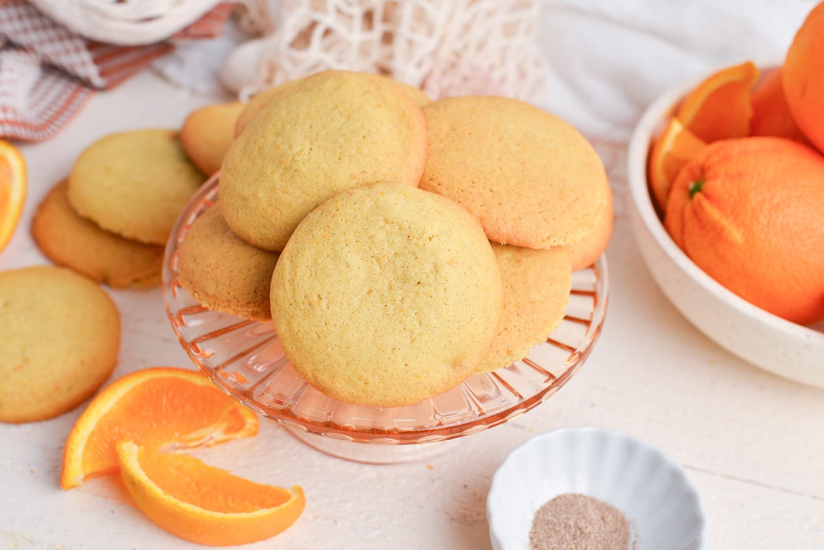 cardamom cookies on a glass serving platter