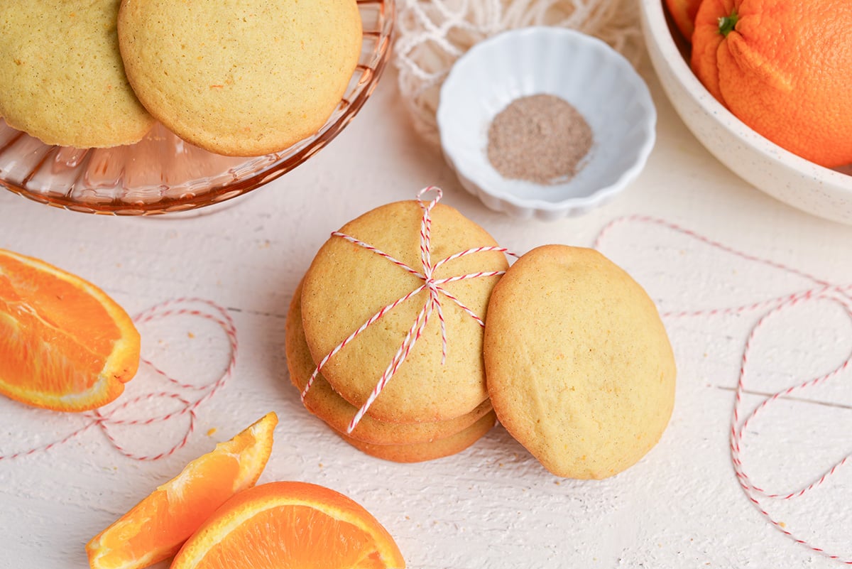 overhead of stack of orange cookies tied with string