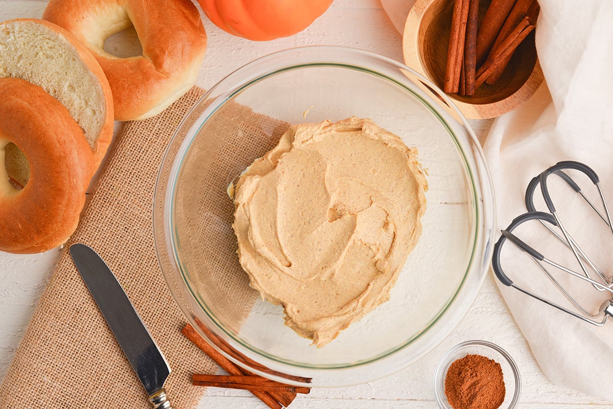 overhead shot of pumpkin cream cheese in mixing bowl