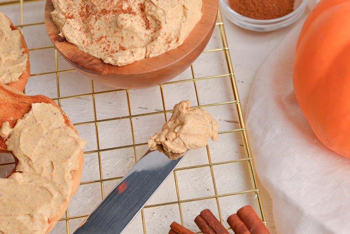 overhead shot of pumpkin cream cheese on butter knife