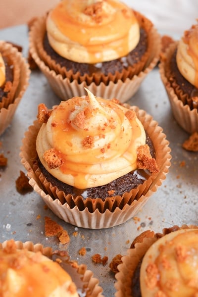 angled shot of chocolate pumpkin cupcakes