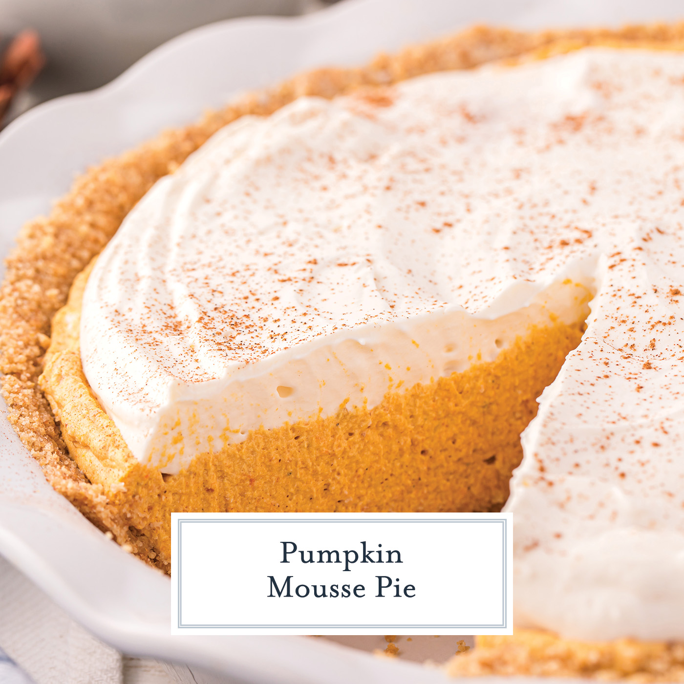 close up angled shot of slice out of pumpkin mousse pie with text overlay for facebook