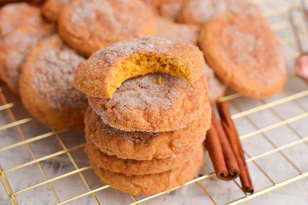 stack of pumpkin snickerdoodles with bite taken out