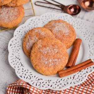 angled shot of three cookies on a plate