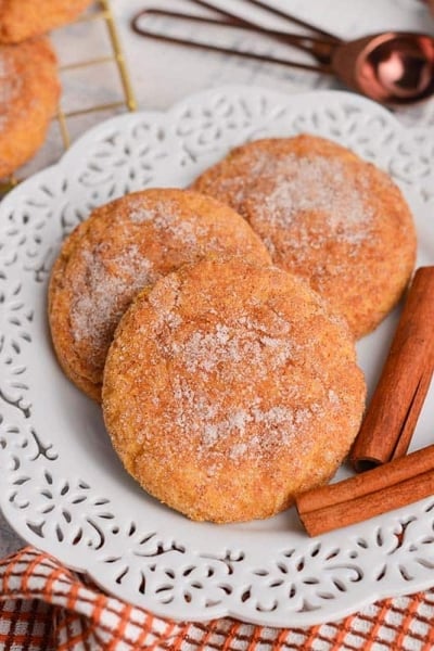 angled shot of three cookies on a plate