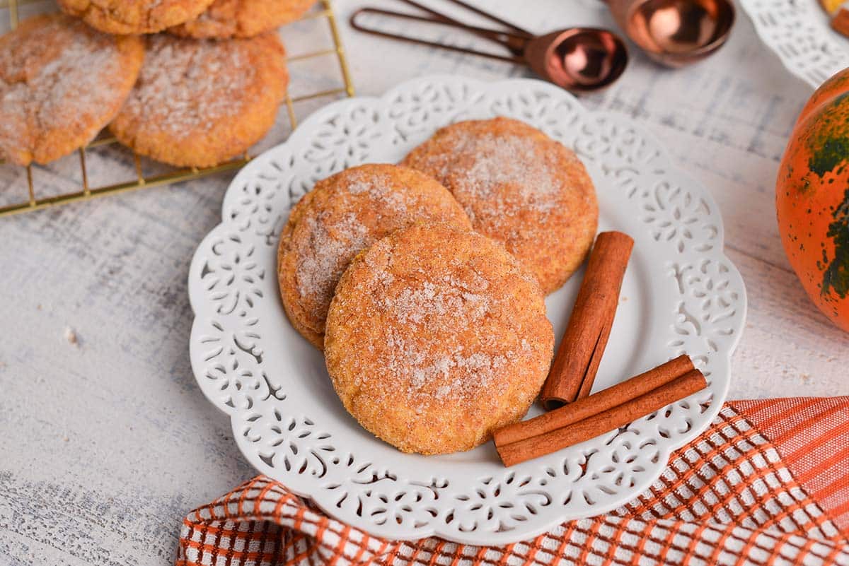 angled shot of three cookies on a plate