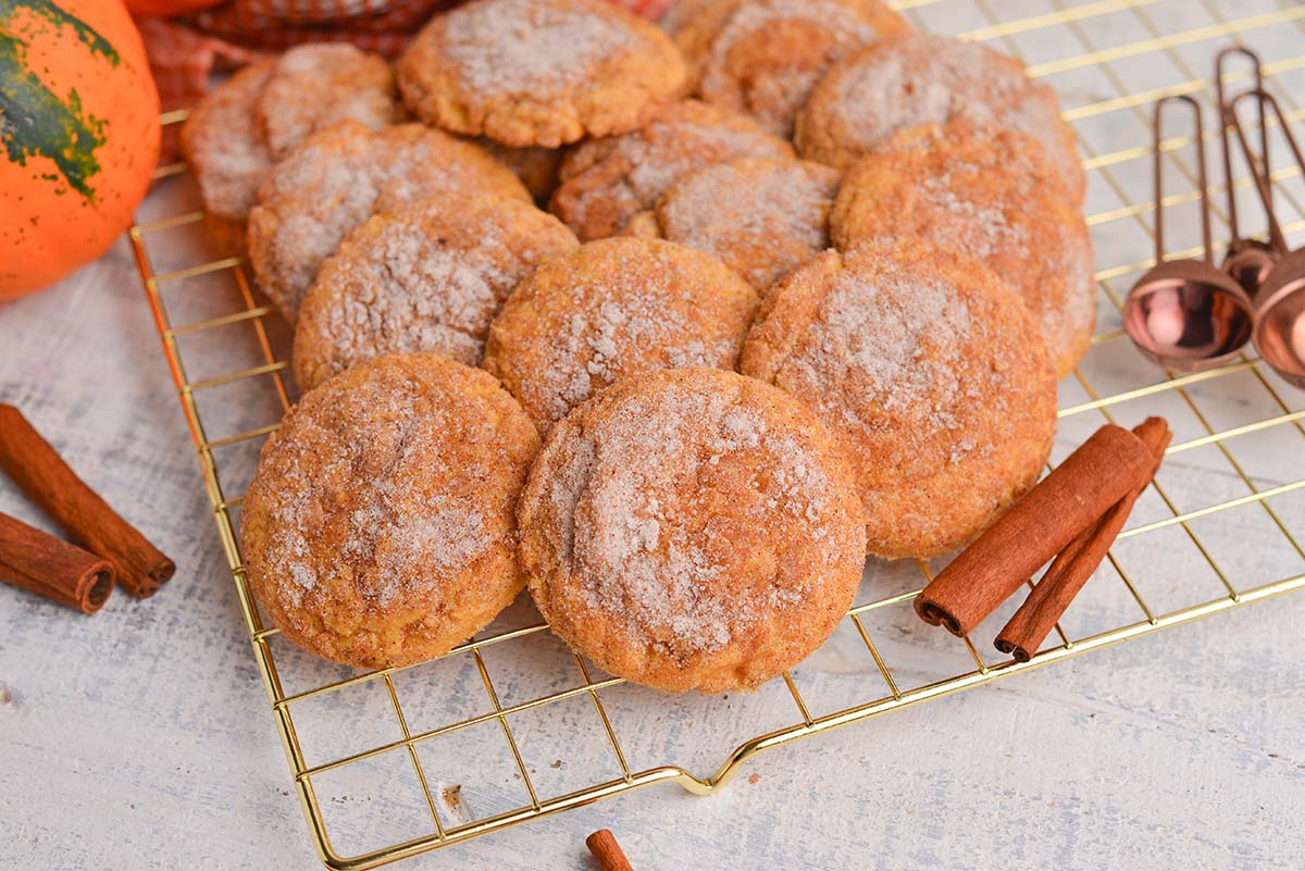 overhead shot of pile of pumpkin snickerdoodles on cooling rack