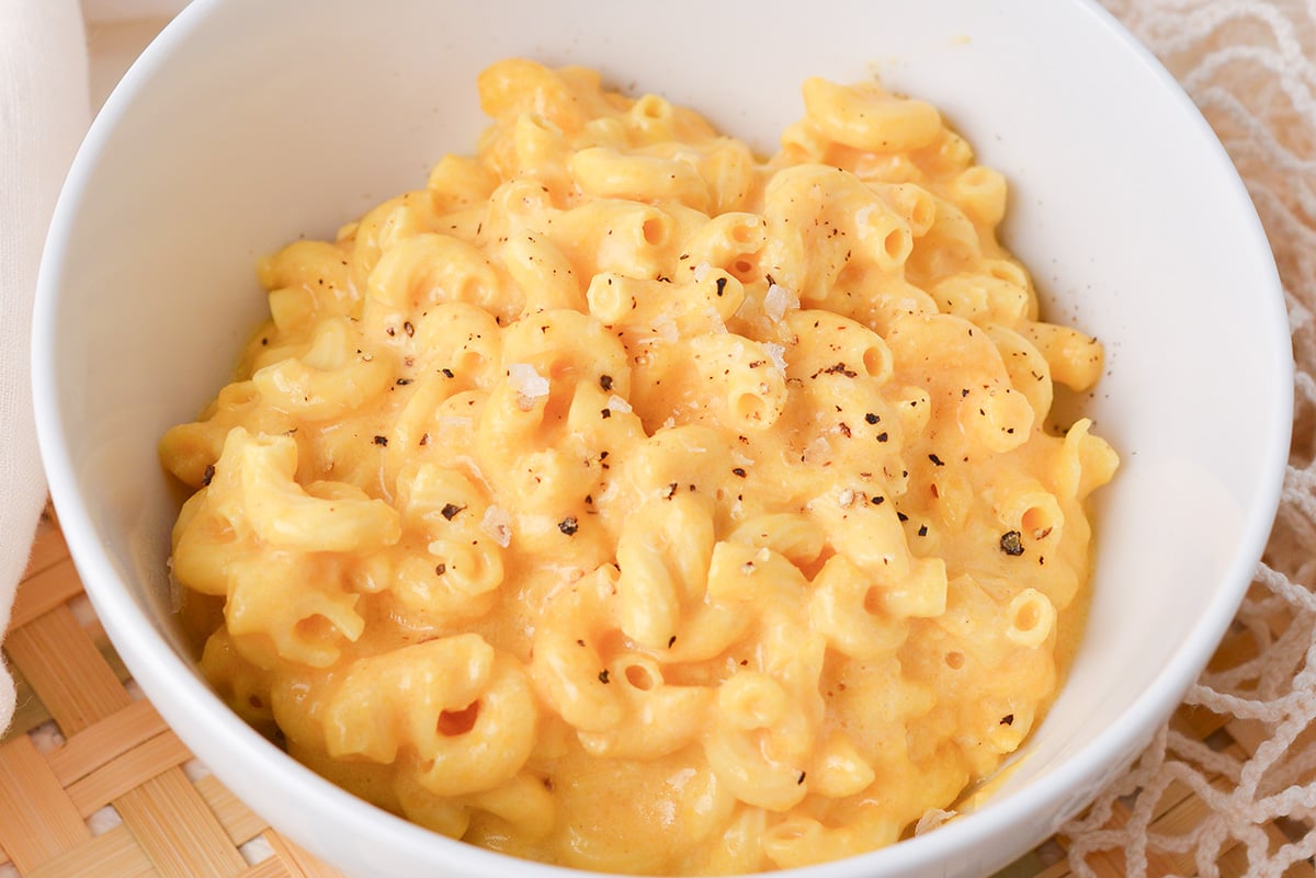 close up angled shot of bowl of crock pot mac and cheese