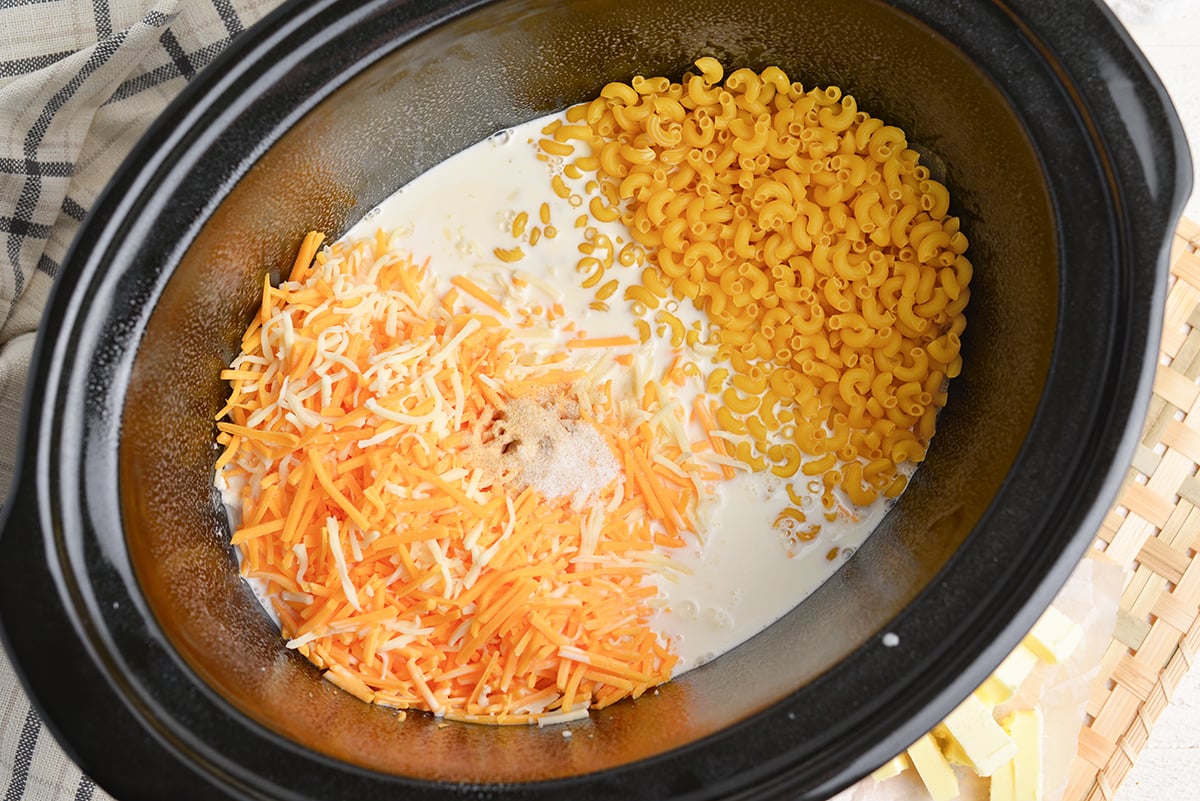 noodles, milk and cheese in slow cooker
