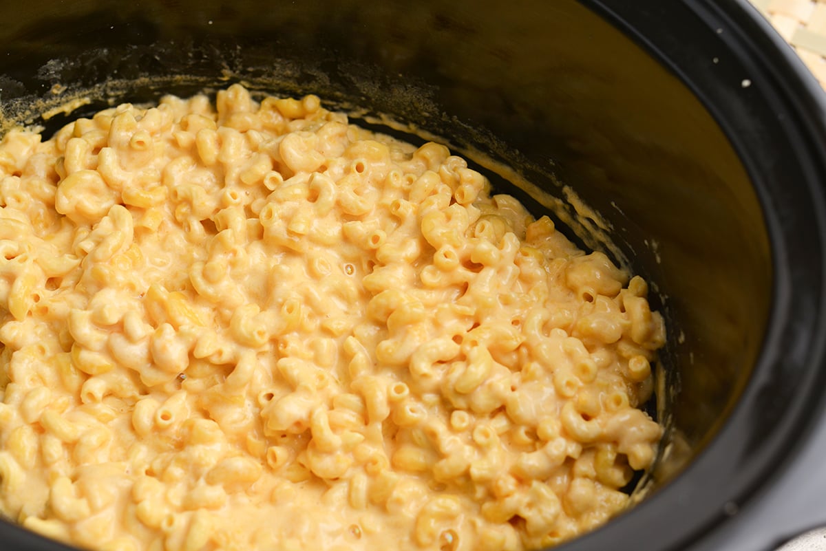 angled shot of mac and cheese in slow cooker