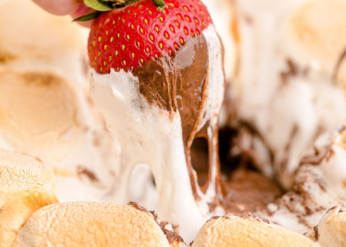 strawberry with melted chocolate and marshmallows