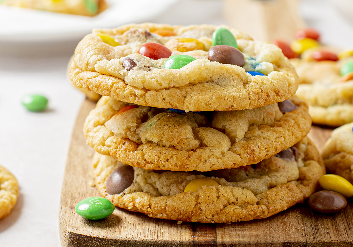 straight on shot of stack of m&m cookies