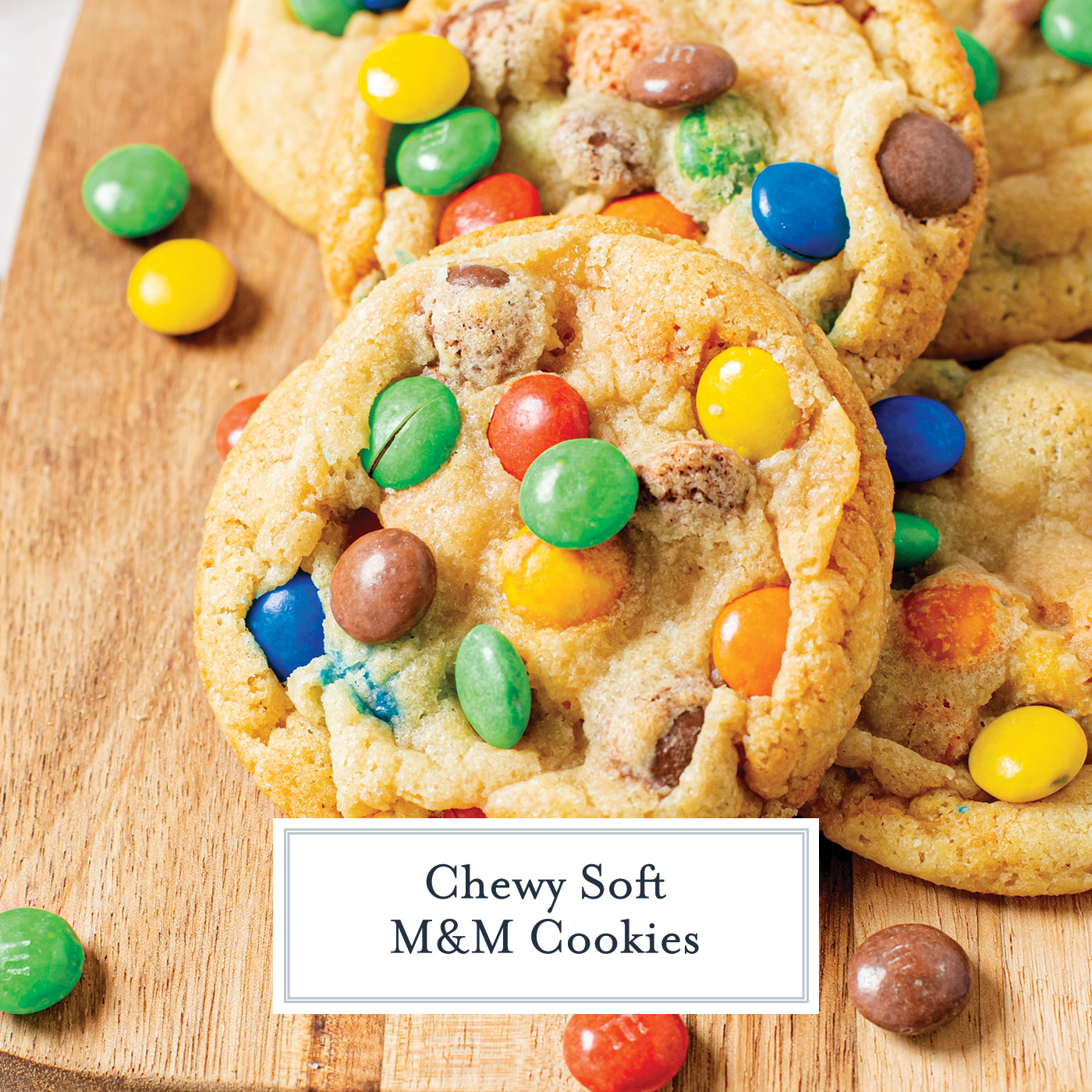 close up angled shot of m&m cookies with text overlay for facebook