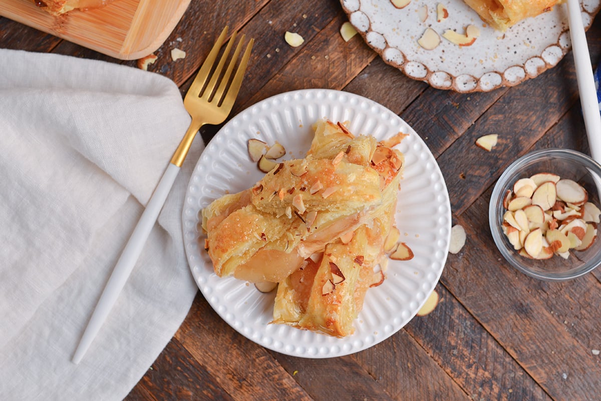 overhead shot of two slices of apple strudel on plate