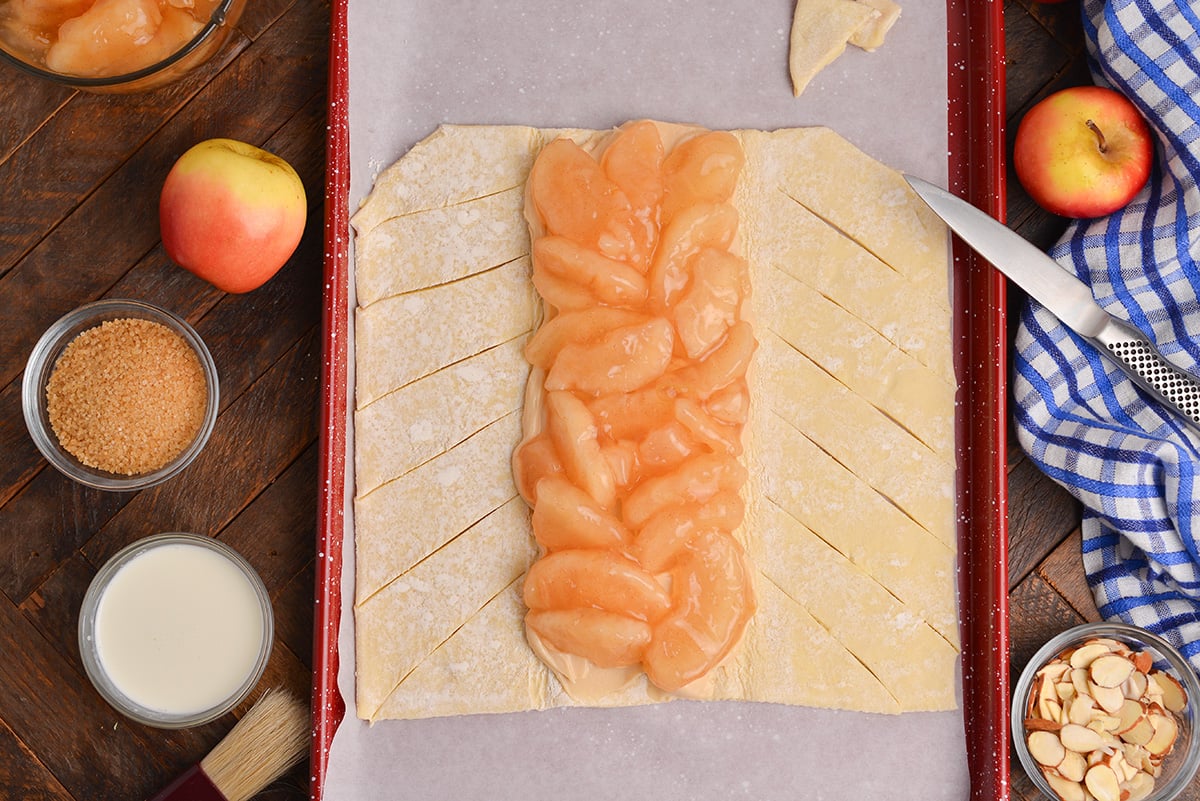 overhead shot of apple pie filling on puff pastry