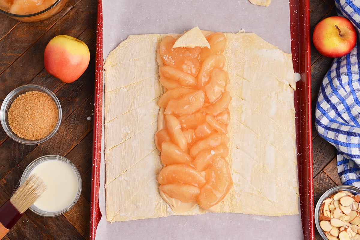 overhead shot of puff pastry brushed with melted butter