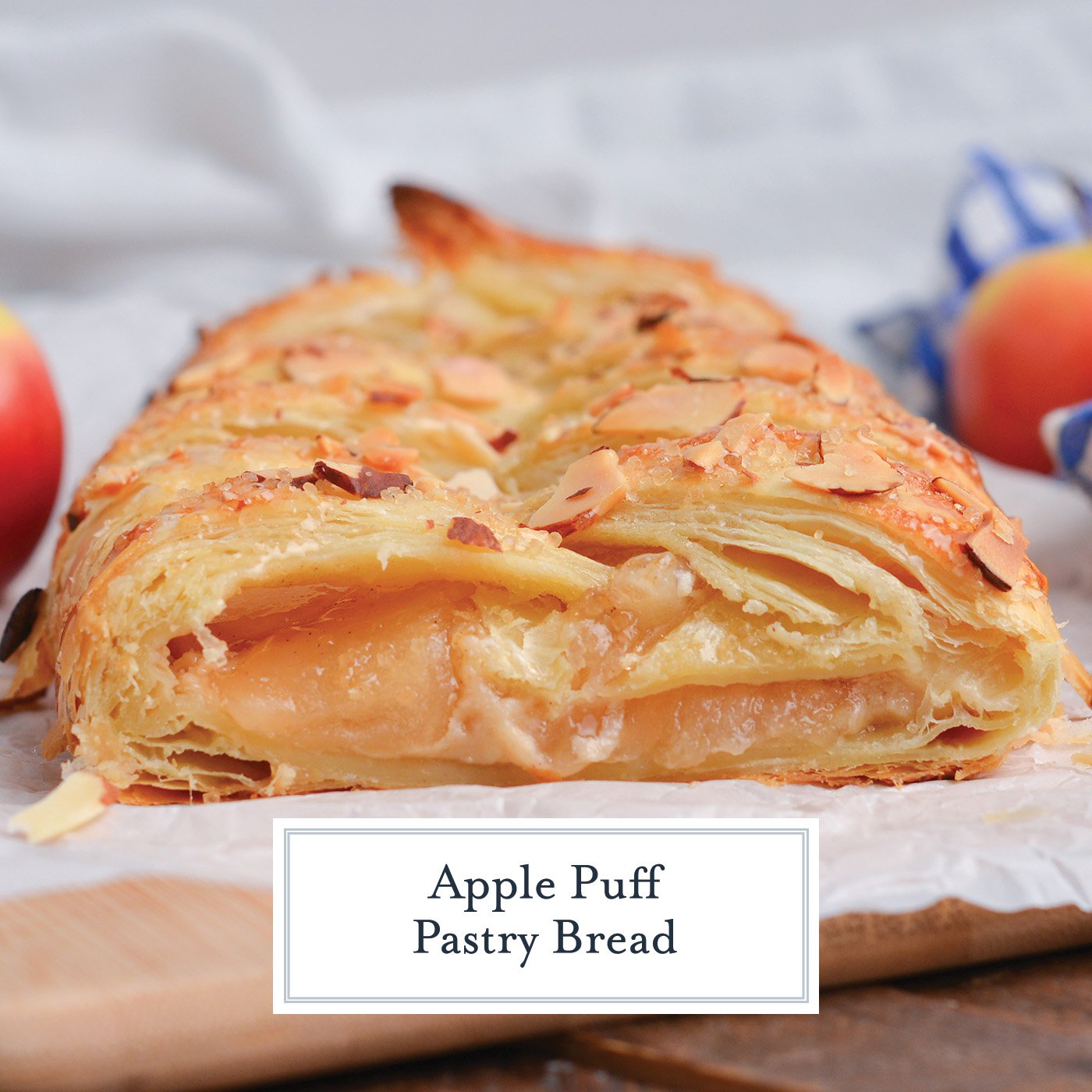 straight on shot of cut apple strudel with text overlay for facebook