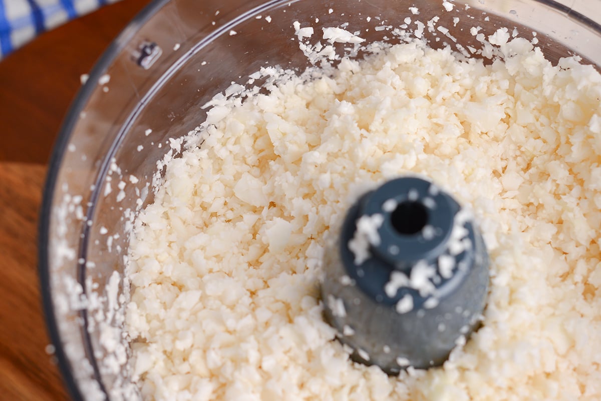 close up shot of cauliflower in food processor