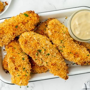 overhead shot of tray of crispy baked chicken tenders