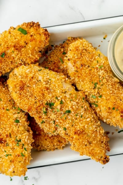 overhead shot of tray of crispy baked chicken tenders