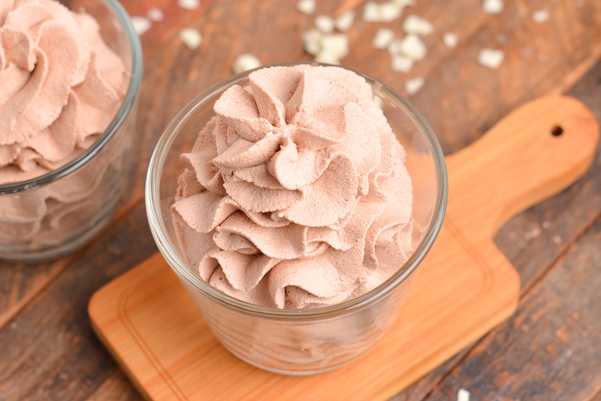 close up of homemade whipped cream in a jar